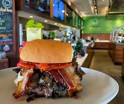 Wahlburgers signature dishes O.F.D. Originally from “Dorchestah”The Original MeltSmahl Burger